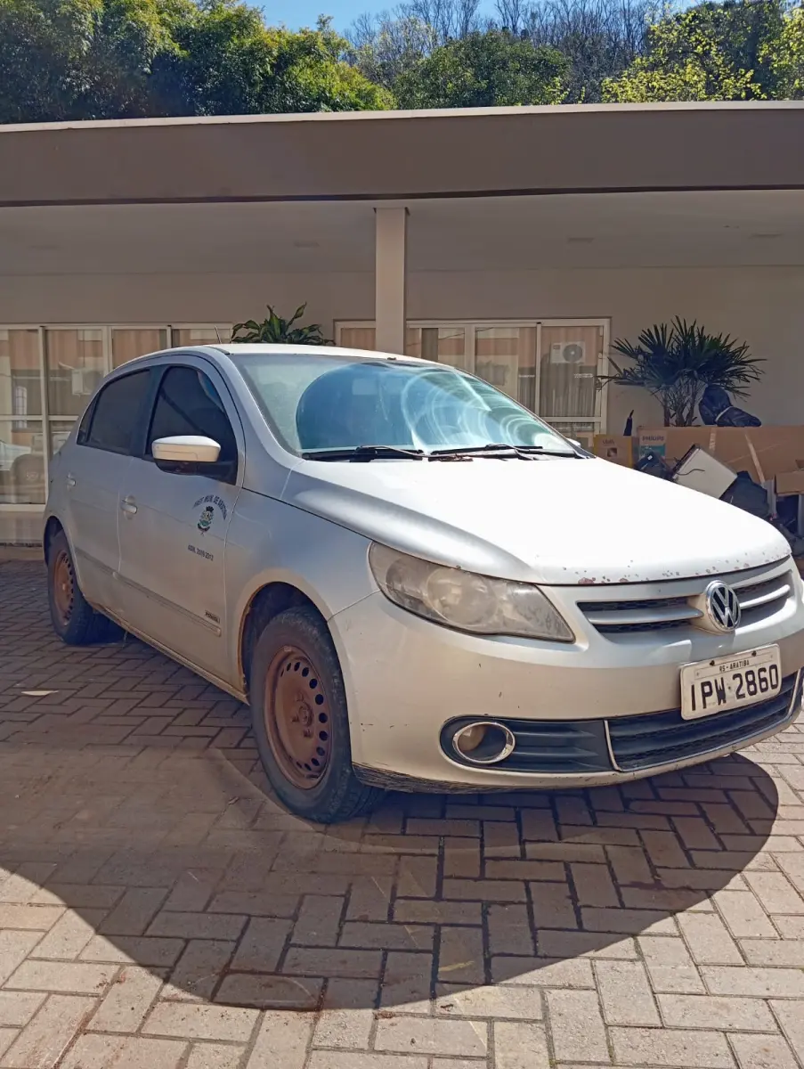 LOTE 021 - AUTOMOVEL VOLKSWAGEM GOL 1.6 POWER, ALCO/GASOL, 2009/10 E RADIO AUTOMOTIVO C/CD MPE E USB PIONNER