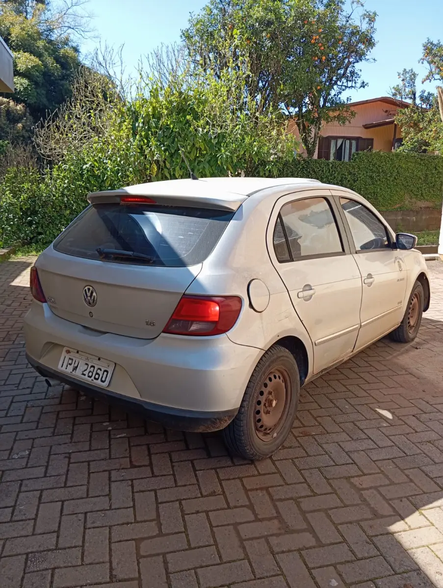 LOTE 021 - AUTOMOVEL VOLKSWAGEM GOL 1.6 POWER, ALCO/GASOL, 2009/10 E RADIO AUTOMOTIVO C/CD MPE E USB PIONNER