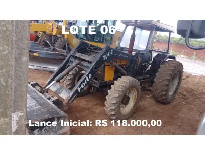 LOTE 006 - TRATOR AGRÍCOLA COM CONCHA HIDRÁULICA, Marca VALMET, Modelo 78.5, motor diesel, cor amarela, ano de fabricação 2006