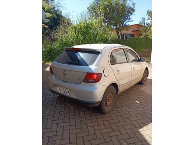 LOTE 021 - AUTOMOVEL VOLKSWAGEM GOL 1.6 POWER, ALCO/GASOL, 2009/10 E RADIO AUTOMOTIVO C/CD MPE E USB PIONNER