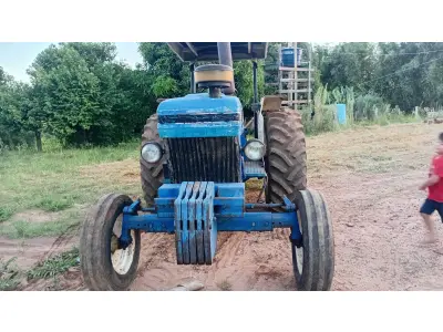 Trator Ford 5610,  Arado,  Roçadeira, Carreta agricola, Grade niveladora
