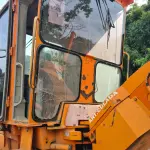 LOTE 000 - MOTONIVELADORA FIAT ALLIS, ano e modelo 2002, cor laranja, 20T/140CV, cor laranja, movida a diesel, com chassi 10Y00680, placa IKP-0109