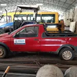 LOTE 003 - CAR/CAMINHONETE/C. Aberta Fiat/Strada Fire, 70t/067cv, vermelha, 2004/2005
