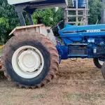 TRATOR FORD 5610,  ARADO,  ROÇADEIRA, CARRETA AGRICOLA, GRADE NIVELADORA